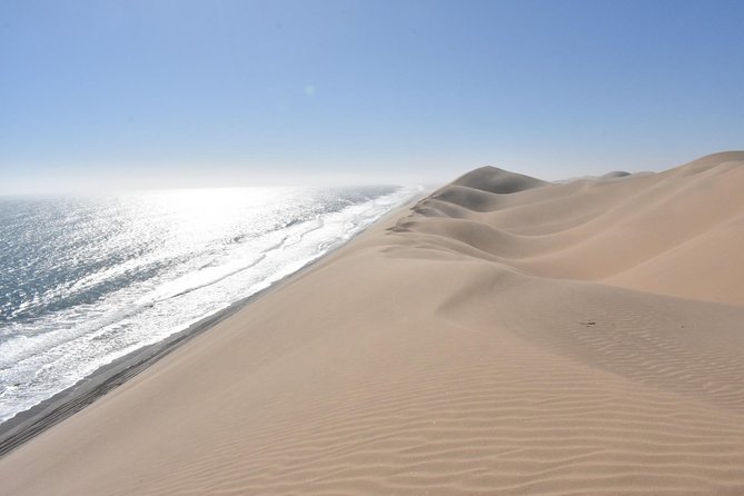 Exhilarating Sandwich Harbour 4x4: Guided Self drive experience - Getting there from Swakopmund to Walvis Bay, and why the timing works