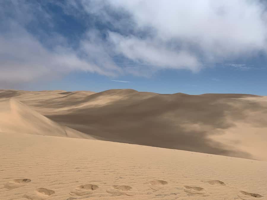 Namibia; Classic Sandwich Harbour Tour - Entering Sandwich Harbour, Where Ocean Meets Dunes