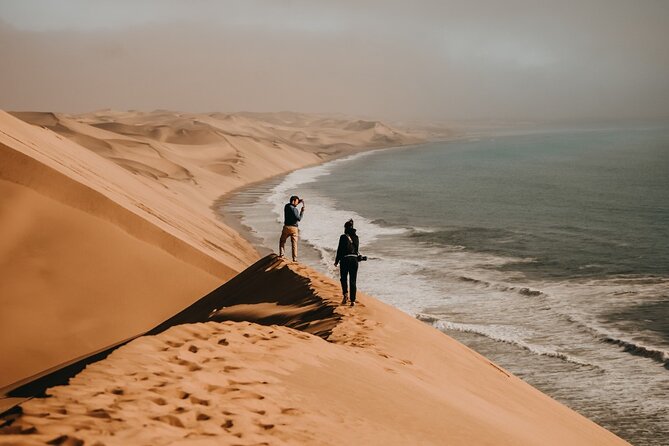 Sandwich Harbour 4x4 Guided Tour - Unforgettable Adventure - Walvis Bay Esplanade: lagoon views plus pink water moments