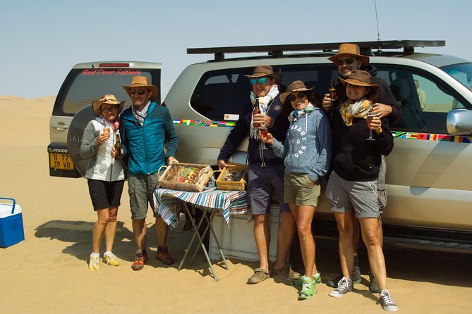 Sandwich Harbour & Pelican Point Full Day Tour - Namib Desert and Sandwich Harbour vibes: dunes that meet the Atlantic