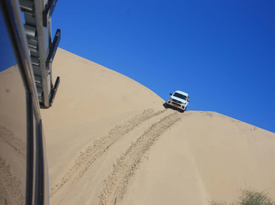 Self-Drive Guided Tour to Sandwich Harbour - Sandwich Harbour beach, the narrow strip where dunes meet the Atlantic