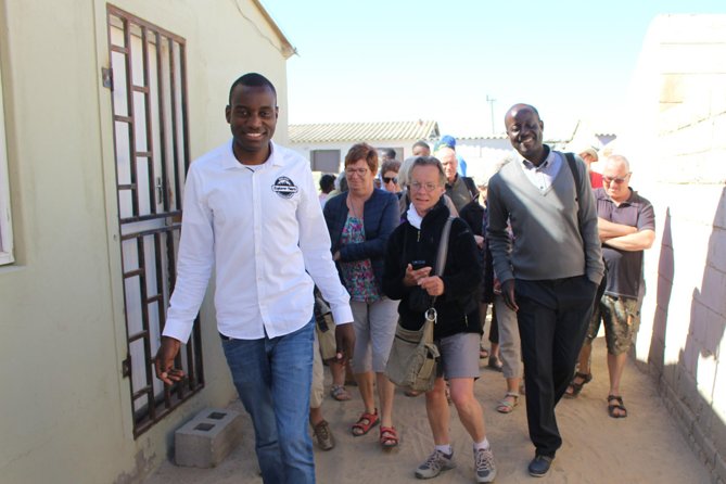 Swakopmund Explorer Township Tour in Mondesa with Nande the Township Local Guide - Entering Mondesa with Nande: market walks and respectful street time