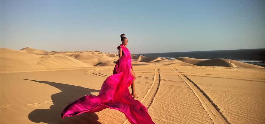 Walvis Bay and Sandwich Harbour Tour - Climbing the dunes at Sandwich Harbour, then sandboarding