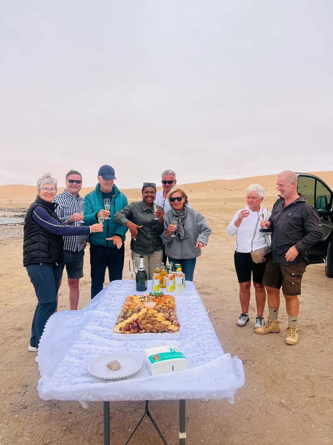 Walvis Bay: Half-Day Tour with Dune 7 and Pink Lake - Swakopmund jetty stop: a photo pause with seaside energy