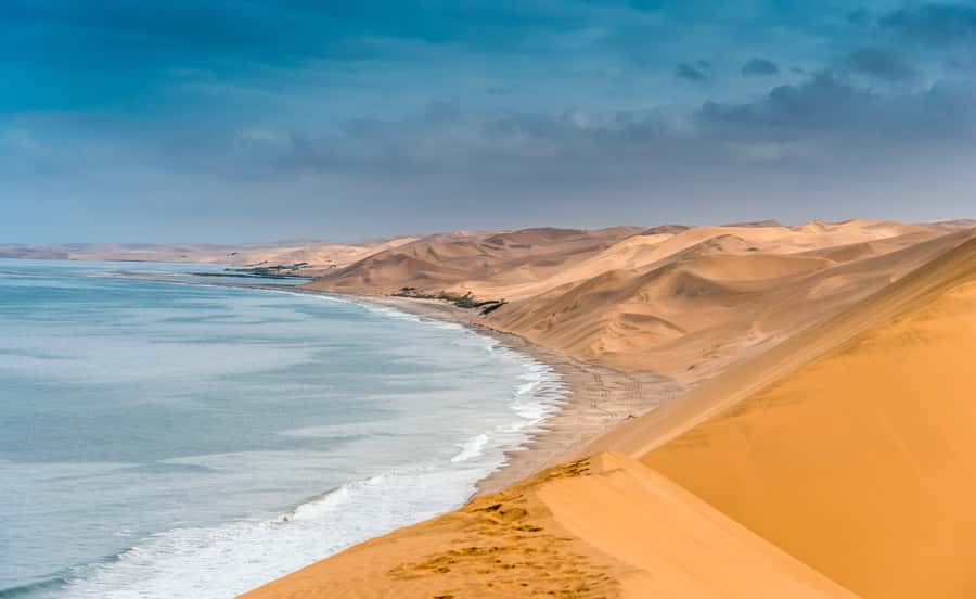 Walvis Bay: Sandwich Harbour Sunset Photography Tour - The Atlantic coast drive, wetland atmosphere, and tide reality checks